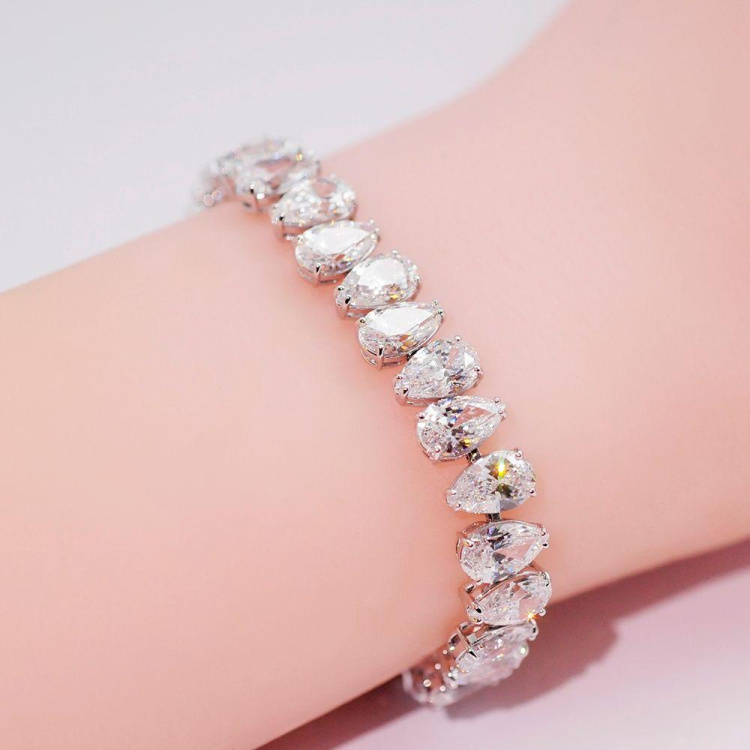 Millenia bracelet, Pear cut, White, Rhodium plated